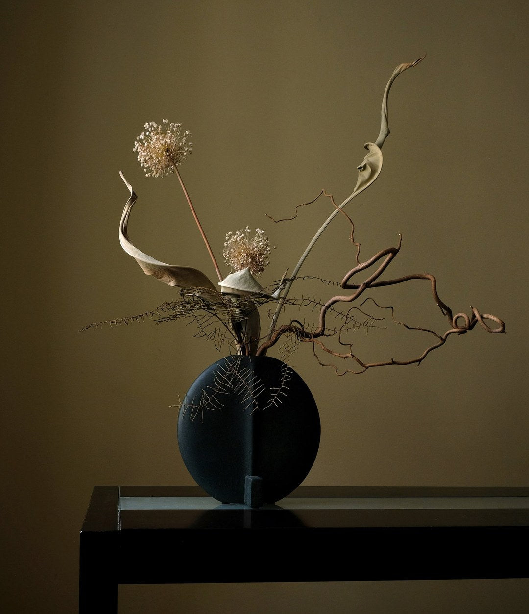 Guggenheim Vase, Petit by 101 Copenhagen in Black in a styled interior – In Dubai by WSPR