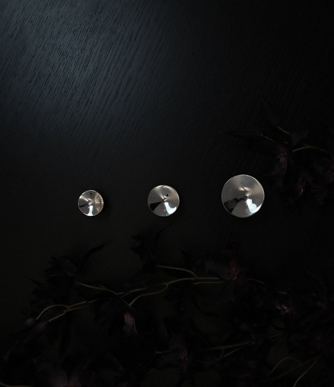 HiHat Knobs, Mini by 101 Copenhagen in Chrome in a styled interior – In Dubai by WSPR
