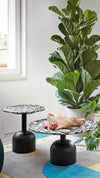 Illo Coffee Table by Miniforms styled in black with speckled tops on a colourful rug – In Dubai by WSPR