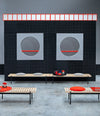Interchange Bench by Sancal benches with red seats and tables in a gallery space – In Dubai by WSPR