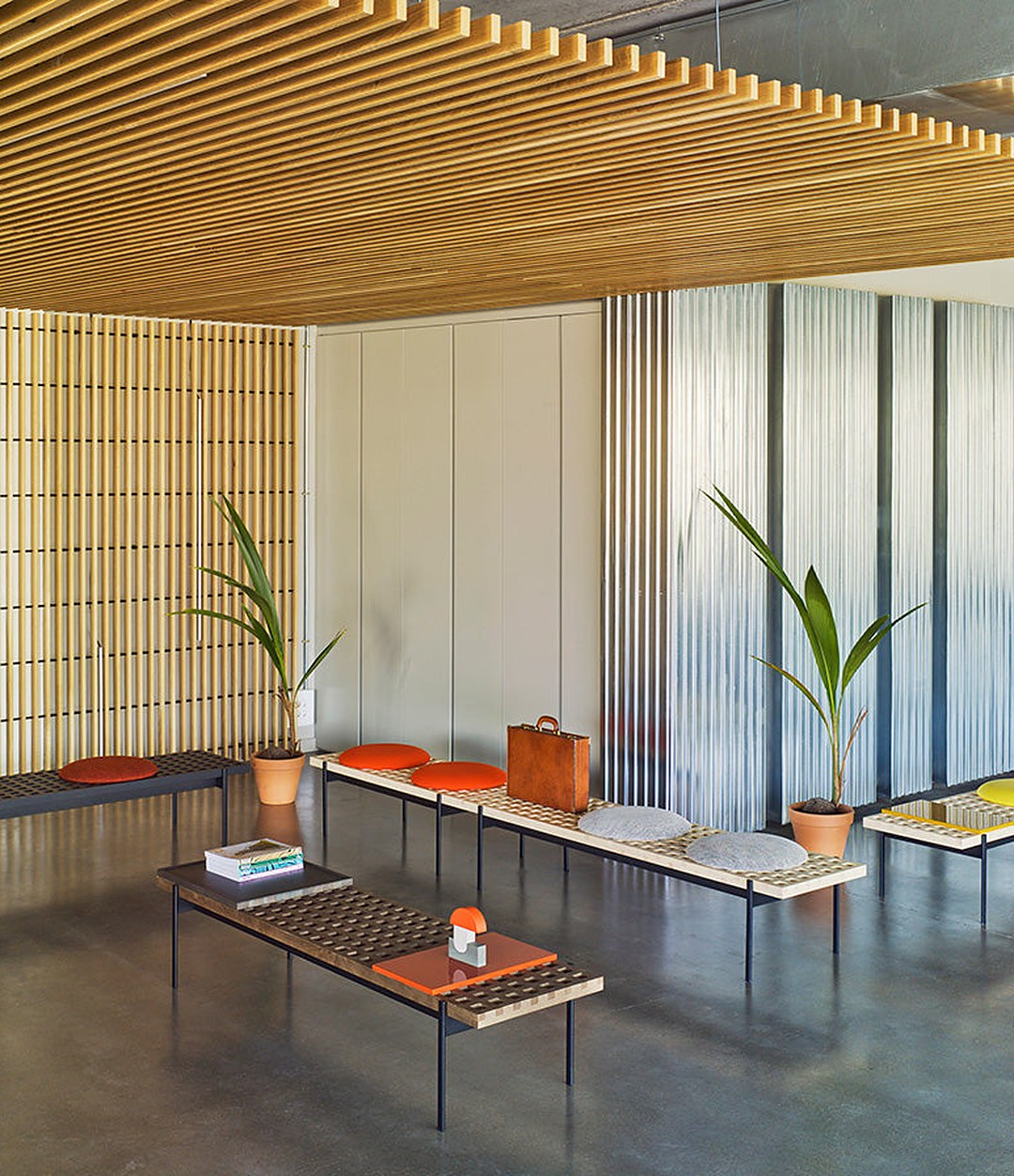 Interchange Bench by Sancal benches with seats and tables in a hotel lobby – In Dubai by WSPR