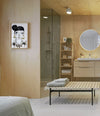Interchange Bench by Sancal in natural ash at the foot of a bed – In Dubai by WSPR