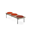 Interchange Bench by Sancal in natural ash with three red seats, three-quarter view – In Dubai by WSPR