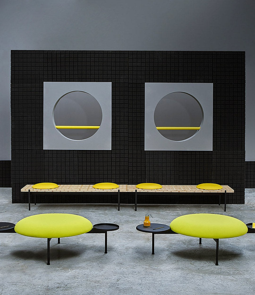 Interchange Bench by Sancal benches with yellow seats in a gallery space – In Dubai by WSPR