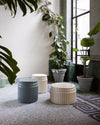 Kolos Coffee Table by Miniforms styled among plants on a mosaic floor, in blue and cream ceramic – In Dubai by WSPR