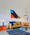 La Isla Coffee Table by Sancal in orange and pale blue beside a sofa – In Dubai by WSPR