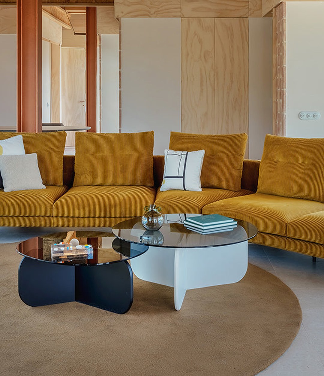 La Isla Coffee Table by Sancal in navy and white beside a velvet sofa – In Dubai by WSPR