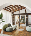 Loop Sofa by Sancal in sage in a whitewashed room – In Dubai by WSPR