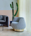 Magnum Lounge Chair by Sancal in blue beside a velvet sofa – In Dubai by WSPR