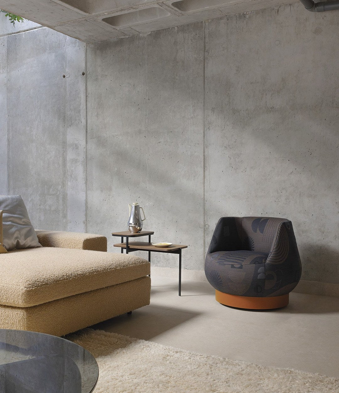 Magnum Lounge Chair by Sancal in charcoal in a concrete room – In Dubai by WSPR