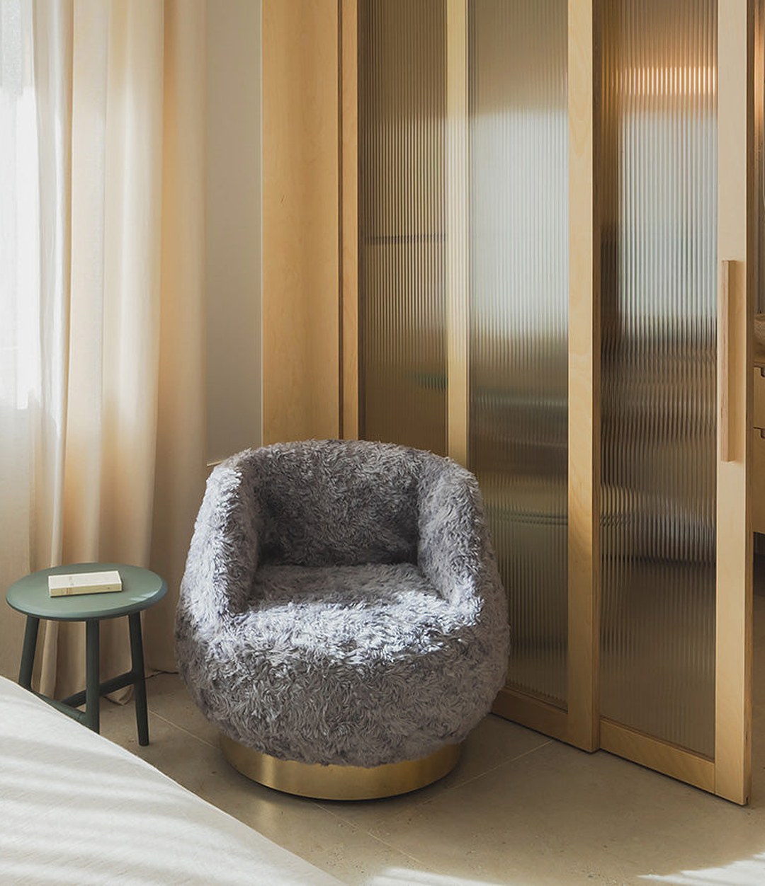 Magnum Lounge Chair by Sancal in grey faux fur in a bedroom – In Dubai by WSPR