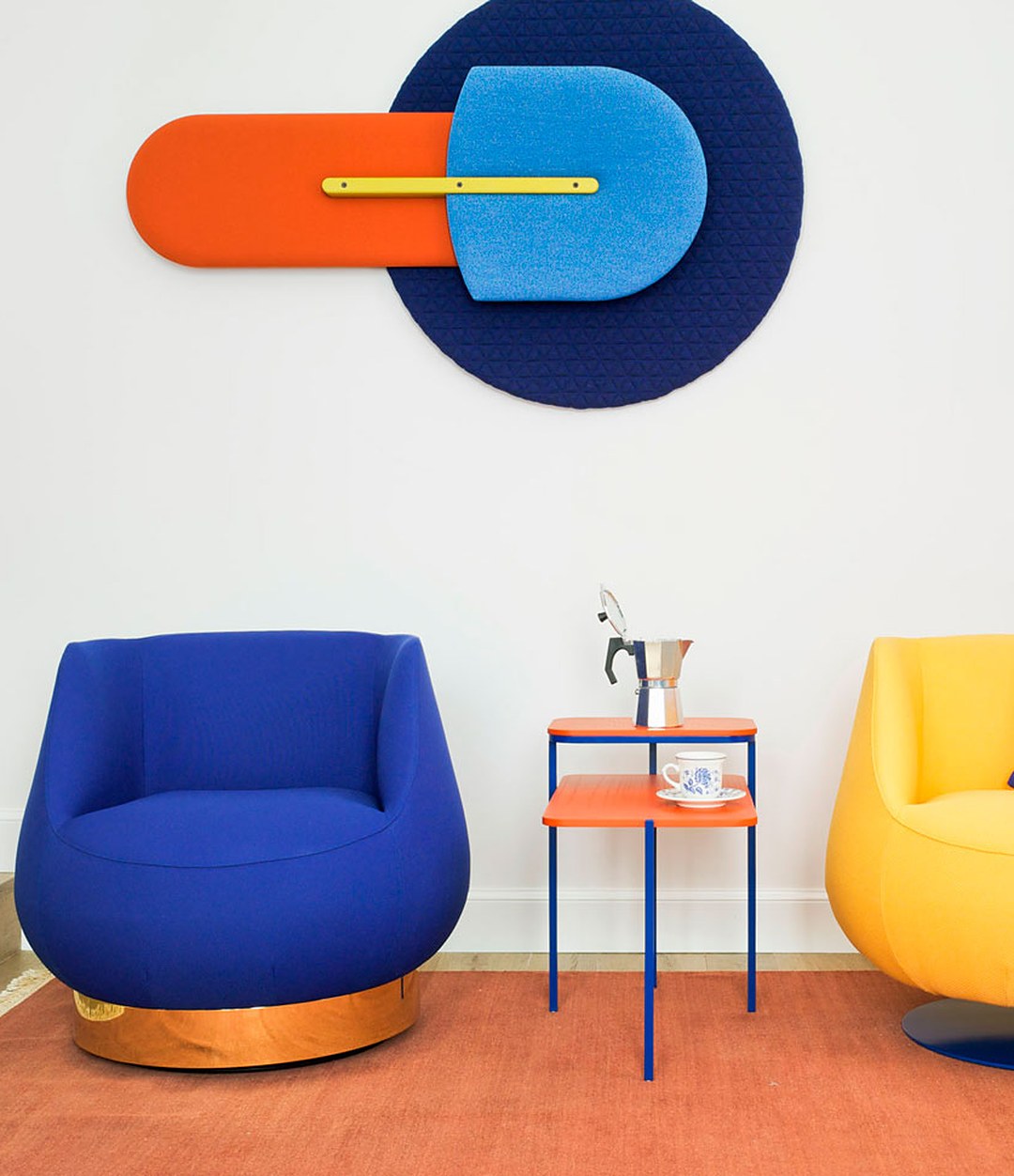 Magnum Lounge Chair by Sancal in blue and yellow in a colourful room – In Dubai by WSPR