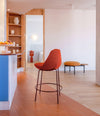 Magnum Stool by Sancal in red in a hallway – In Dubai by WSPR