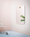 Les Brothers Mirror by Miniforms styled on a soft pink wall above a pale blue rug – In Dubai by WSPR