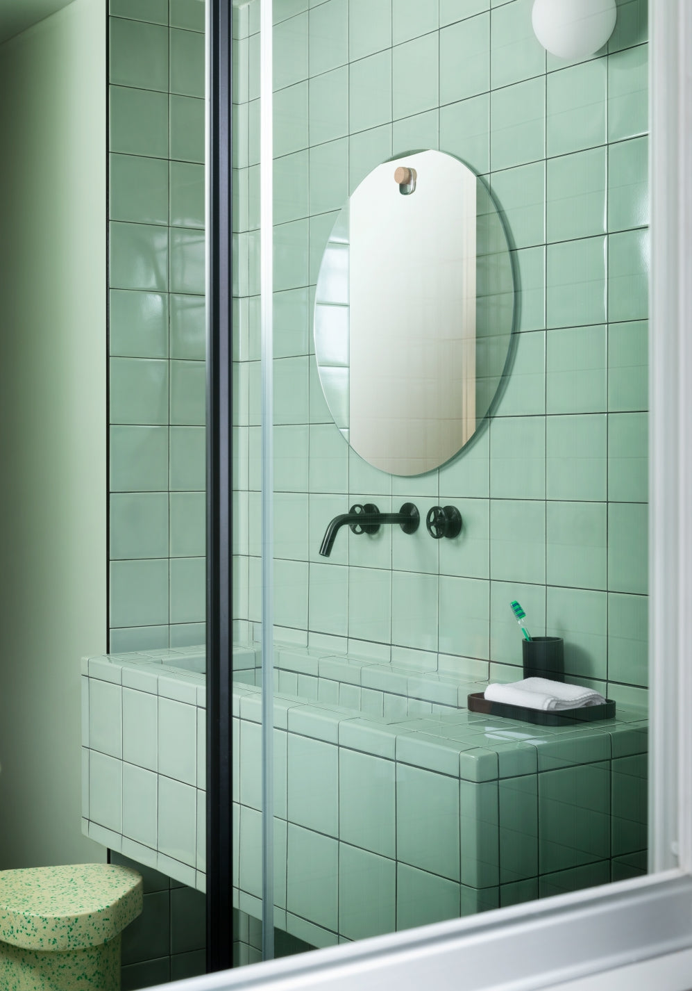 Les Brothers Mirror by Miniforms styled in a mint-tiled bathroom – In Dubai by WSPR