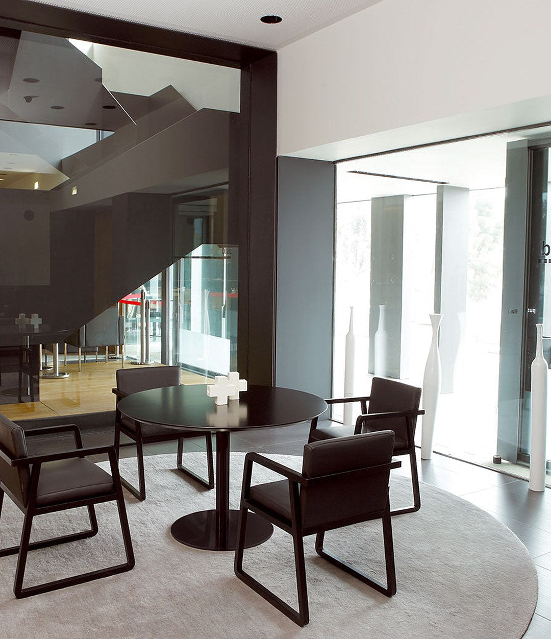 Midori Small Armchair by Sancal in black in a lobby – In Dubai by WSPR