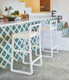 Midori Stool by Sancal in white at a tiled kitchen island – In Dubai by WSPR