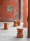 Milo Mila Coffee Table by Miniforms styled among terracotta pieces against a rust-coloured wall – In Dubai by WSPR