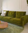 Momic Sofa by Sancal in green velvet with a pink coffee table – In Dubai by WSPR