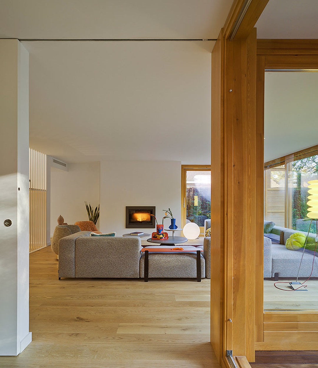 Mousse Modular Sofa by Sancal in cream beside a sliding door – In Dubai by WSPR