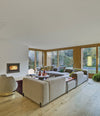Mousse Modular Sofa by Sancal corner composition in cream by a fireplace – In Dubai by WSPR