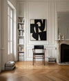 Nama Dining Chair with Armrests by 101 Copenhagen in Classic Brown Oak / Aniline Leather Black in a styled interior – In Dubai by WSPR