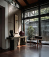 Nama Lounge Chair by 101 Copenhagen in Classic Brown Oak / Leather Black in a styled interior – In Dubai by WSPR