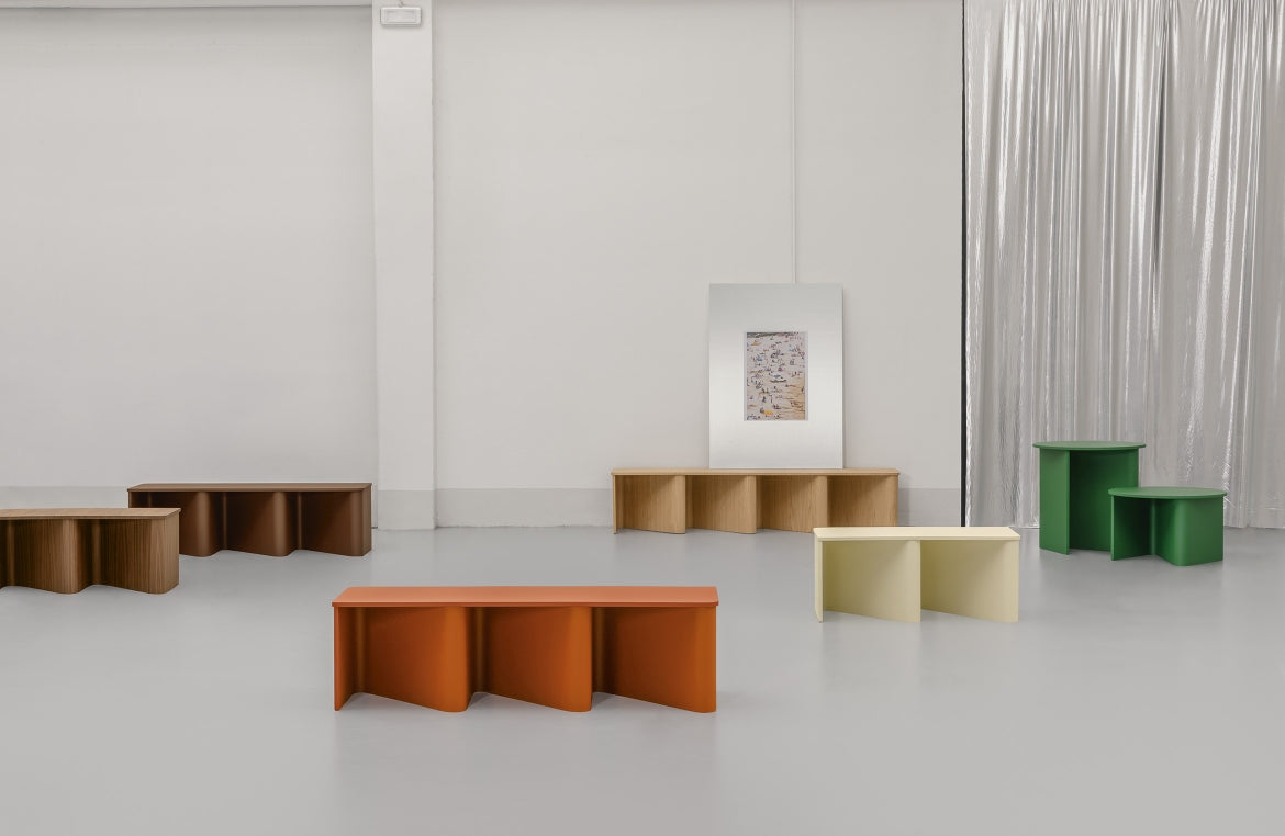 Nami Coffee Table by Miniforms styled in a bright gallery-style space with several lacquered pieces – In Dubai by WSPR