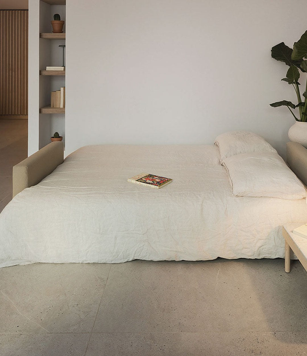 Nap Sofa Bed by Sancal opened into a bed with a mushroom lamp – In Dubai by WSPR