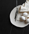 Native Dinner Plate by 101 Copenhagen in Birch in a styled interior, view 2 – In Dubai by WSPR
