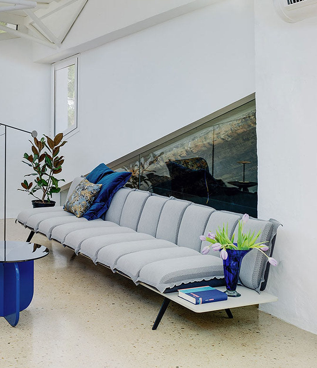 Next Stop Sofa by Sancal in grey in a bright lounge – In Dubai by WSPR