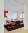 Nido Chair by Sancal in a meeting room with red wheeled bases – In Dubai by WSPR