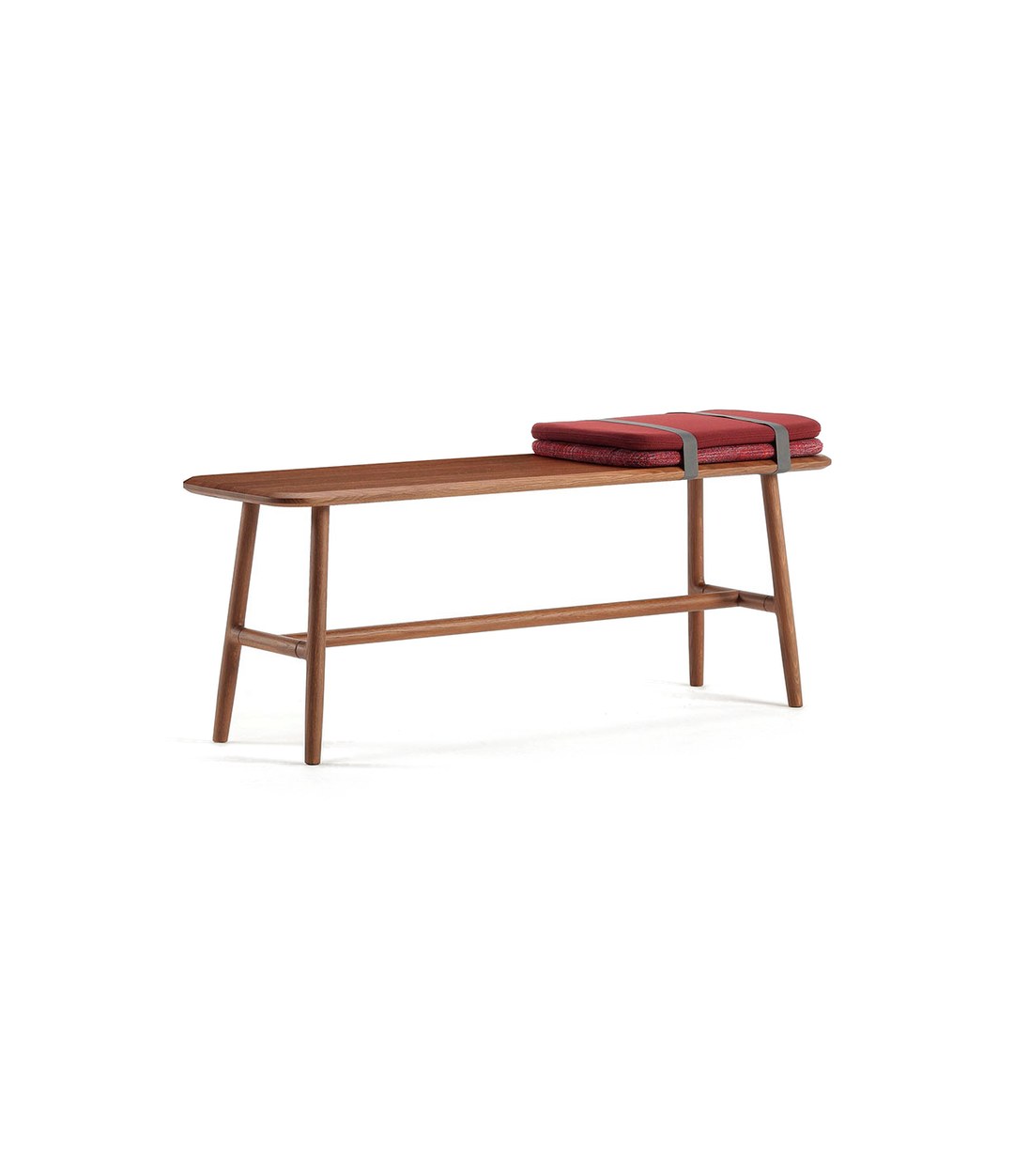Nudo Bench by Sancal in stained oak with a red blanket – In Dubai by WSPR