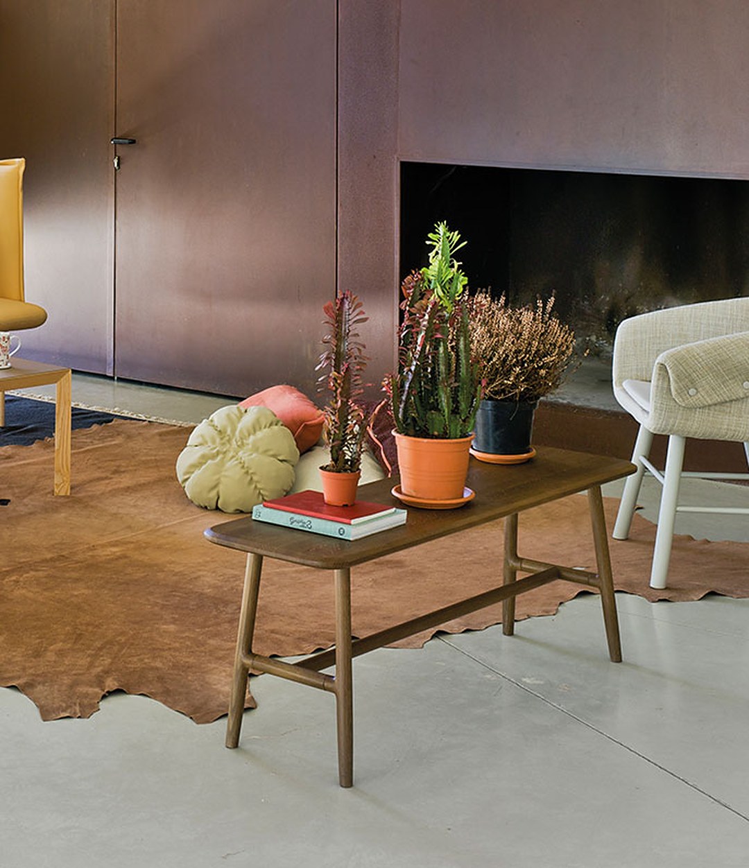 Nudo Coffee Table by Sancal rectangular table in oak by a fireplace – In Dubai by WSPR