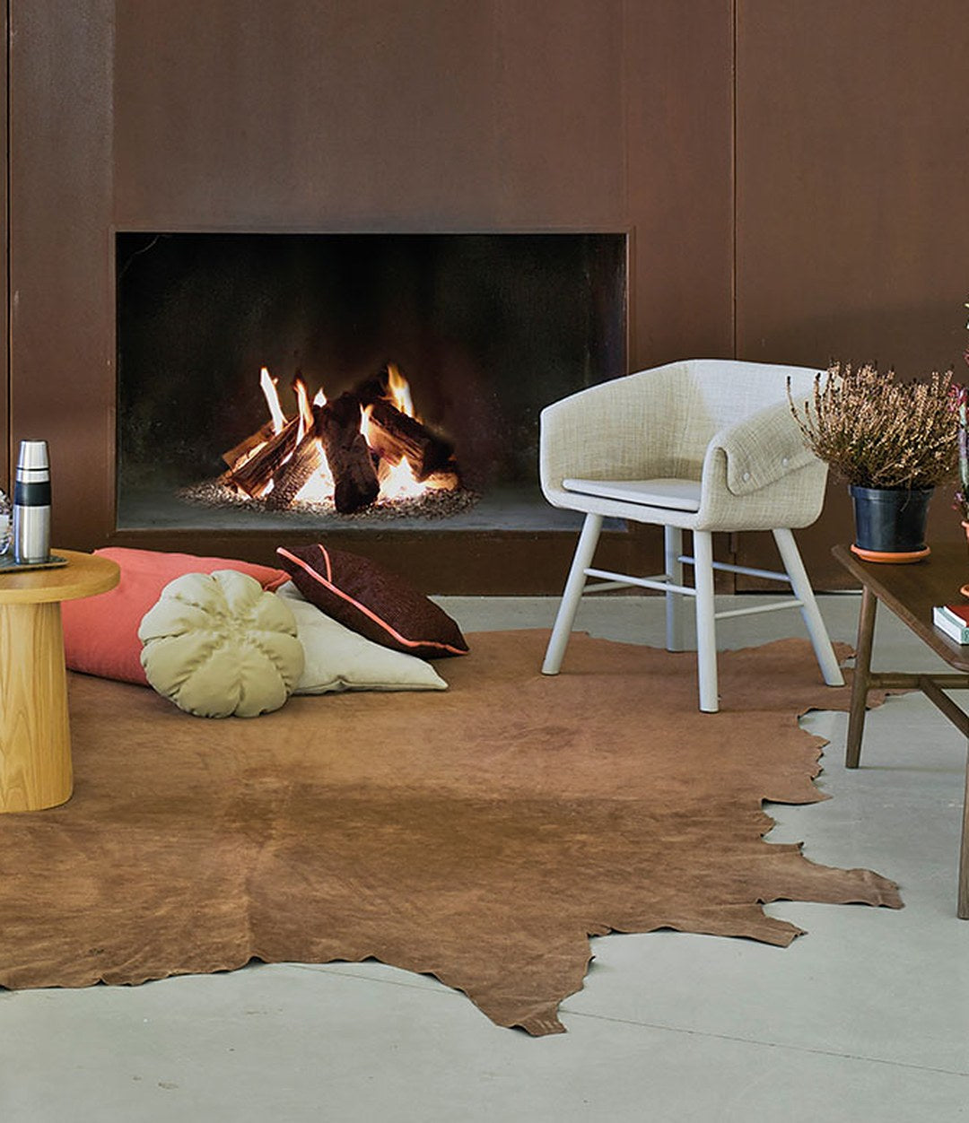 Nudo Coffee Table by Sancal rectangular table in oak on a cowhide rug – In Dubai by WSPR