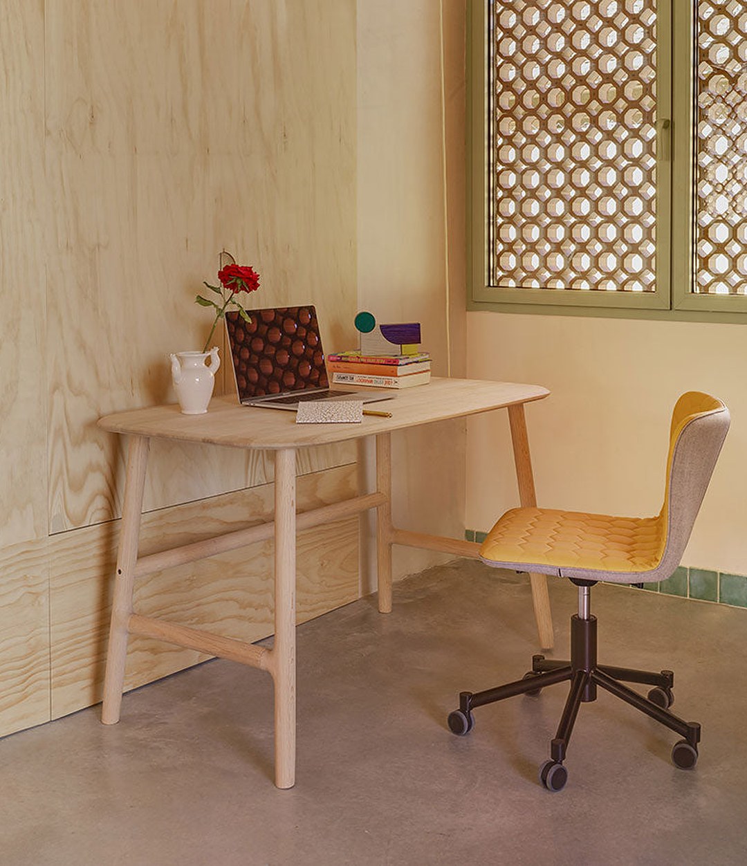 Nudo Desk by Sancal in light oak by a lattice screen – In Dubai by WSPR