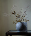 Offset Vase, Mini by 101 Copenhagen in Dark Grey in a styled interior – In Dubai by WSPR