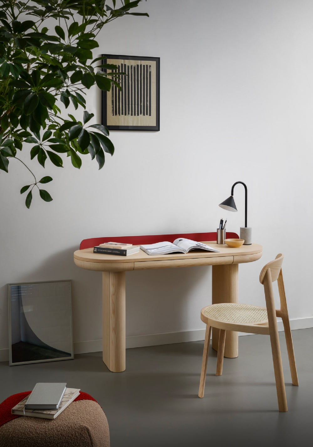 Ozz Desk Lamp by Miniforms styled on a curved wooden desk in a calm room with a plant – In Dubai by WSPR