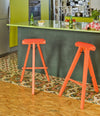 Perigallo Stool by Sancal in orange at a kitchen island – In Dubai by WSPR