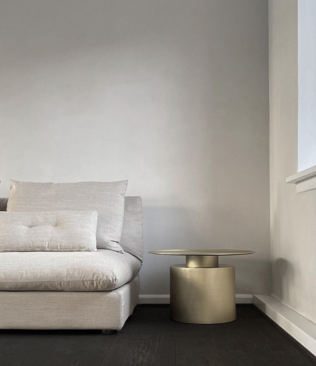 Pillar Table, Low by 101 Copenhagen in Brass in a styled interior, view 3 – In Dubai by WSPR