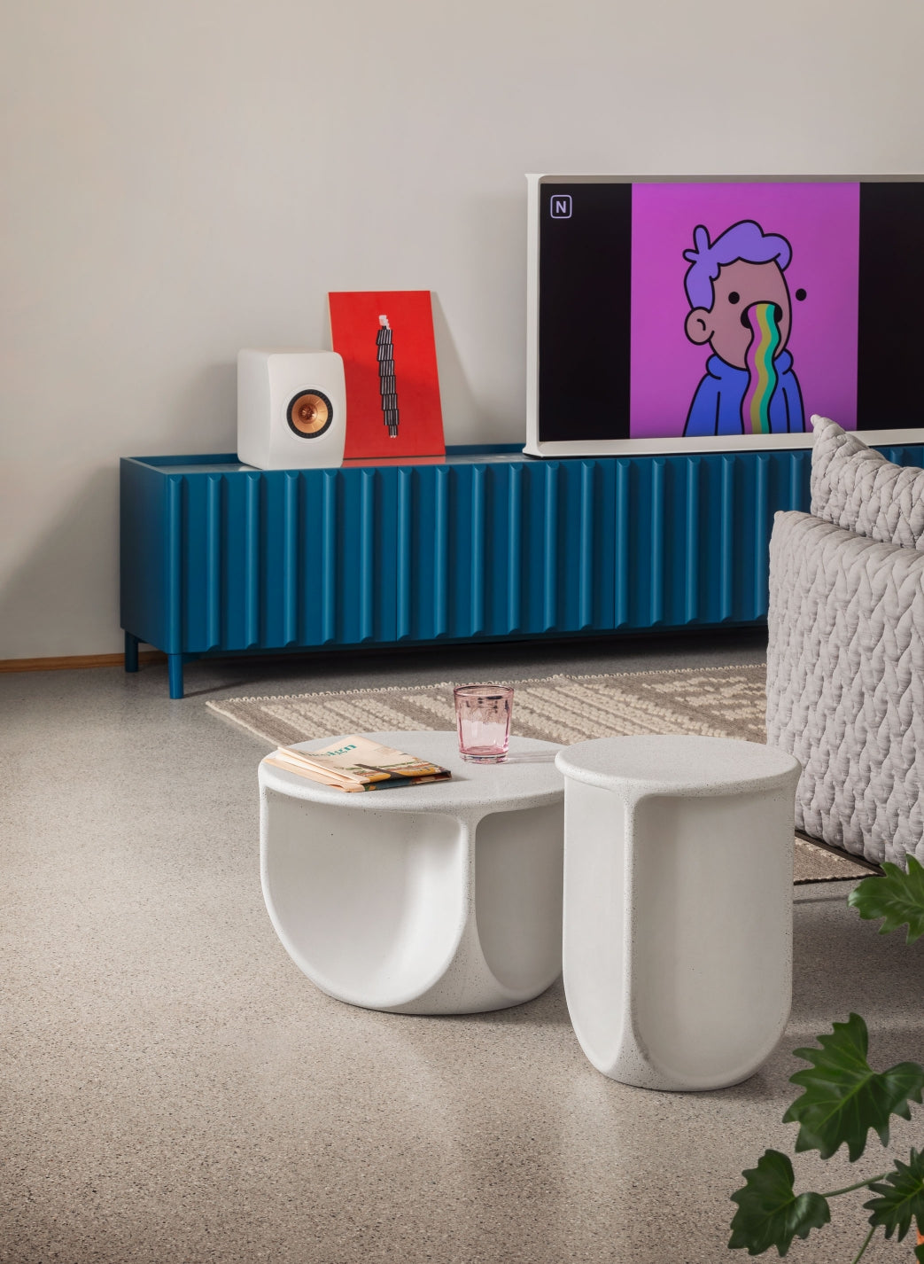 Pinto Coffee Table by Miniforms in a pale concrete finish, two sizes in a living room with a blue sideboard – In Dubai by WSPR