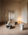 Pinto Coffee Table by Miniforms in grey and pale finishes, scattered across a room with a marble floor – In Dubai by WSPR