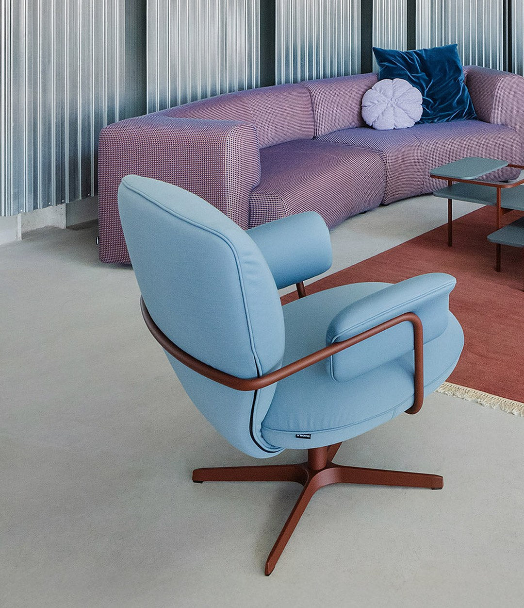 Planta Armchair by Sancal in blue beside a pink sofa – In Dubai by WSPR
