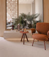 Planta Armchair by Sancal two armchairs in rust among palms – In Dubai by WSPR
