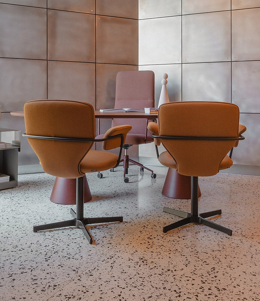 Planta Chair by Sancal in brown with arms in a meeting room – In Dubai by WSPR