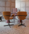 Planta Chair by Sancal in brown with arms in a meeting room – In Dubai by WSPR