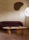 Plautino Coffee Table by Miniforms in oak, styled in front of a plum sofa – In Dubai by WSPR