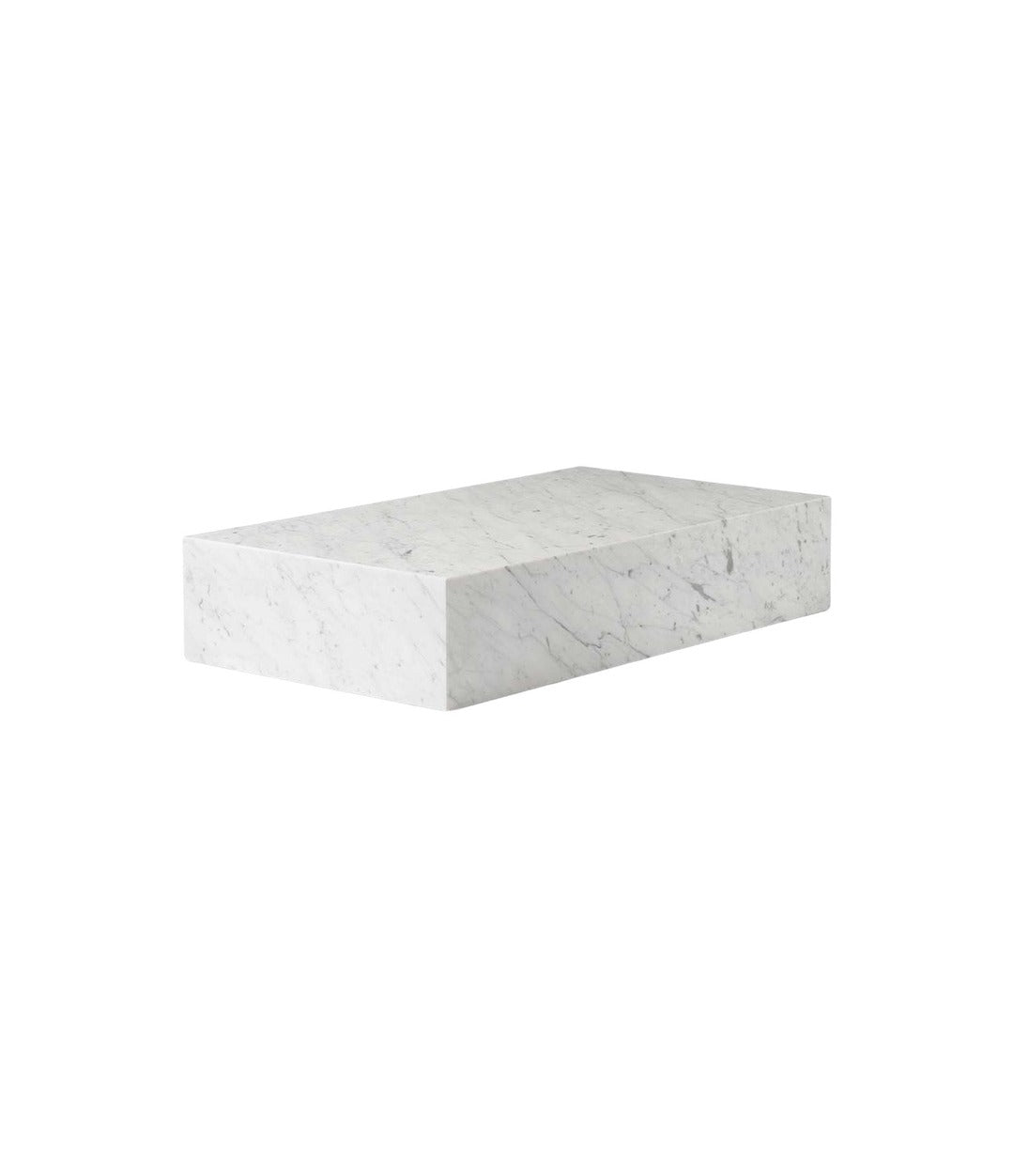 Plinth Table Grand by Audo in Carrara marble, angled view – In Dubai by WSPR