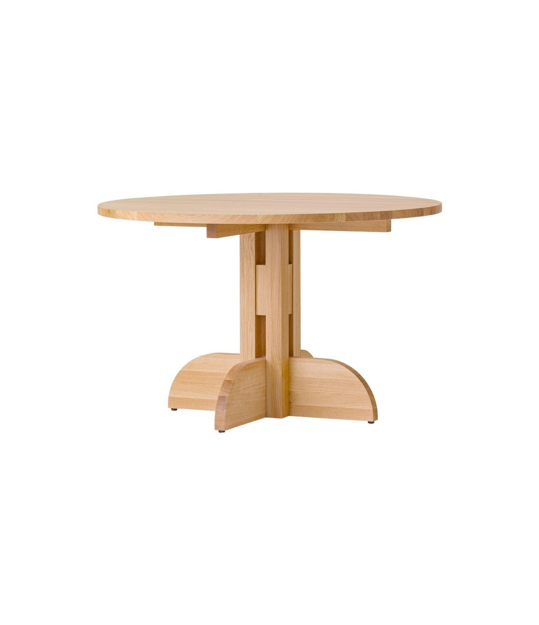 Puffin Dining Table, Round by Audo in natural oak with a solid oak top, angled view – In Dubai by WSPR