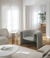 Remnant Armchair by Sancal in pale grey in a bright living room – In Dubai by WSPR